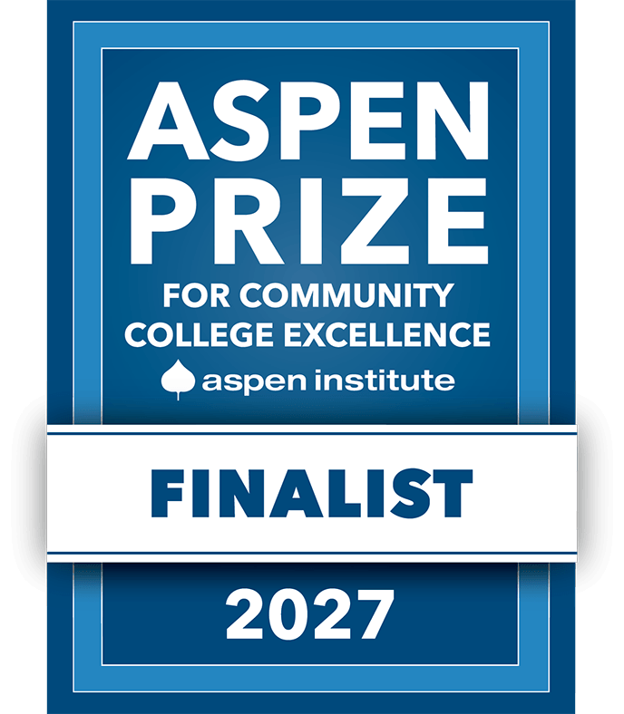 Blue Aspen Prize for Community College Excellence badge with Finalist 2027 and Aspen Institute logo, detailing recognition of CVTC for the Aspen Prize.