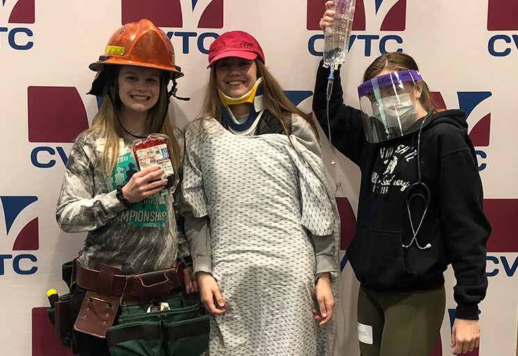 Students standing in front of CVTC backdrop