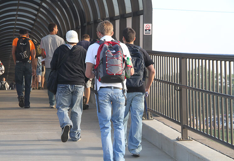 Students walking on the bridge