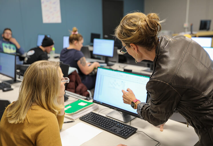 Teaching helping student on computer screen