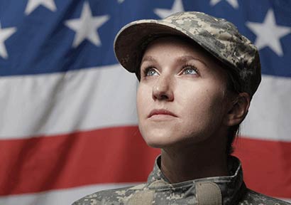 American Military Member with Flag