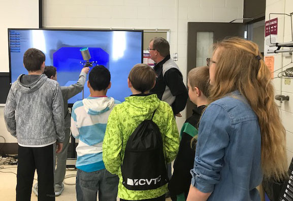 Student Using the Paint Sprayer Simulator