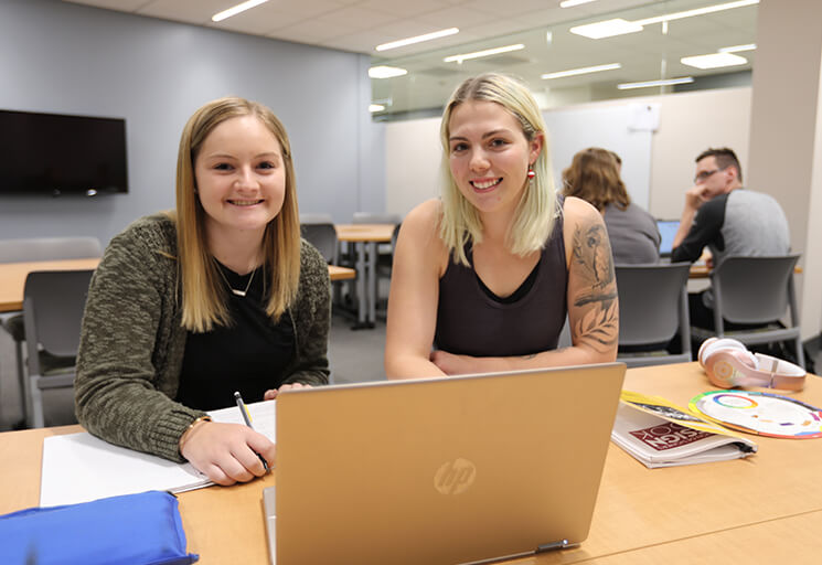 Two Girls with a laptop