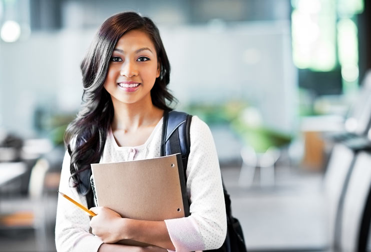 Student Holding a Notebook