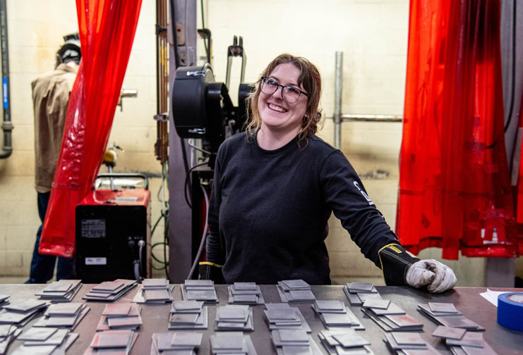 Woman in welding lab