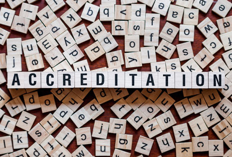 scrabble tiles spelling accreditation