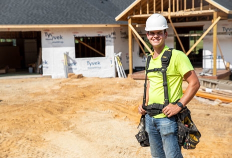 Man in a hardhat at a construction site