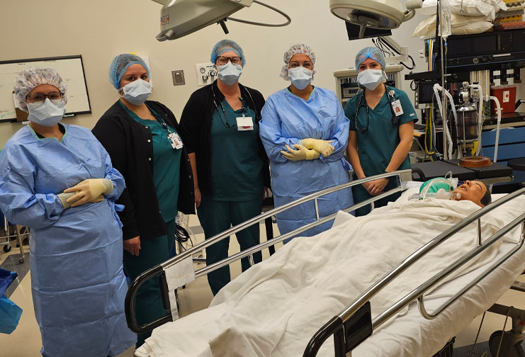Surgical Technologist and Respiratory Therapy students from Chippewa Valley Technical College work with each other in the simulation lab