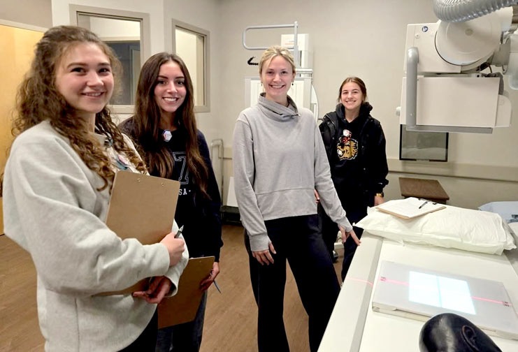 Four female students in the Radiography program at CVTC.