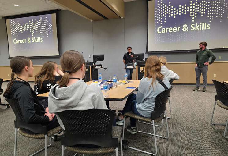 Female students during a STEM conference at a technical college