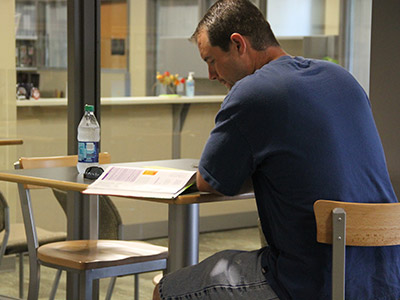 Man studying in the library